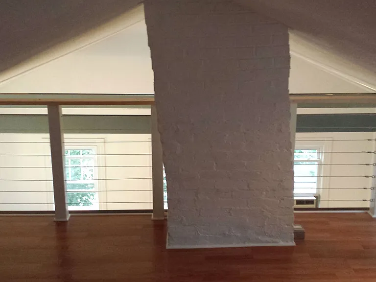 18. Stair to loft from end of kitchen
