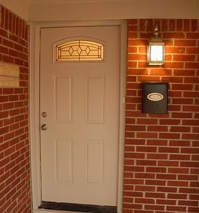 Covered front entry welcome visitors