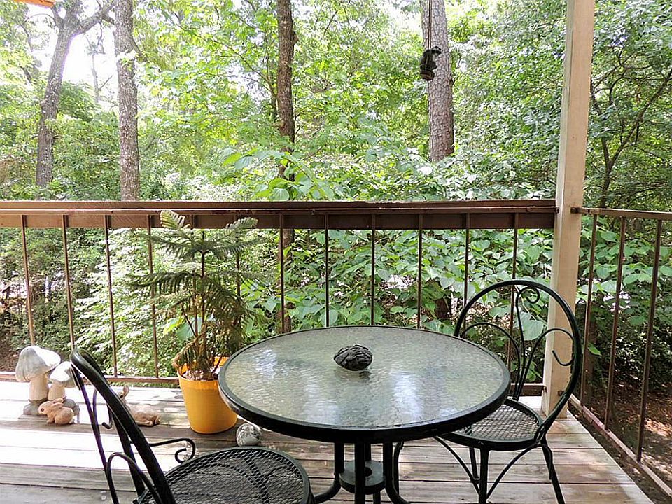 Unit balcony overlooks green area