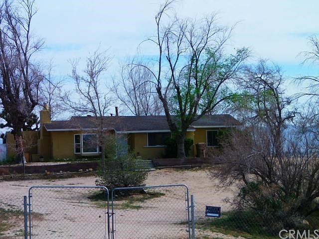 The bay window to the left of the front door is dual pane and is in the family room. The window to the right is the Master Bedroom. The window to the far right goes to Bedroom No. 2.
