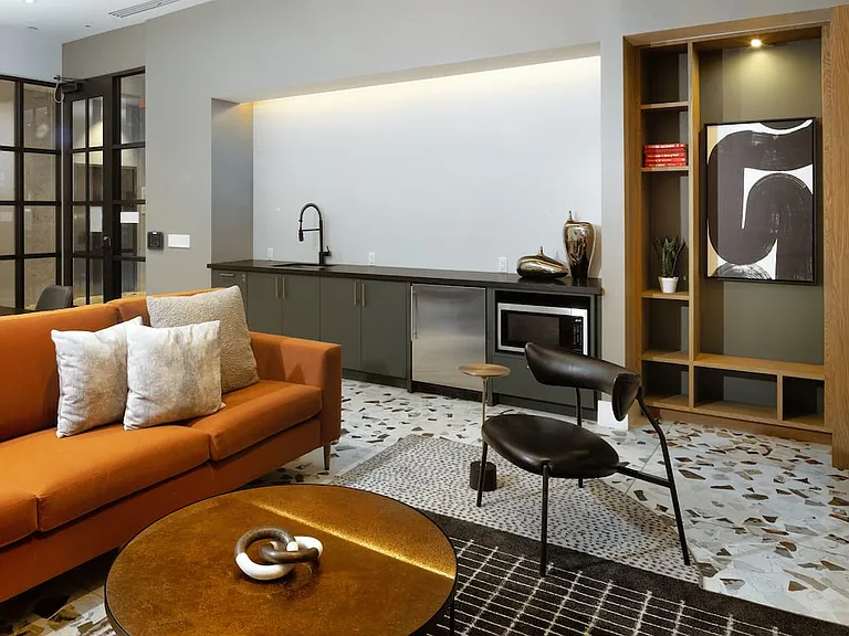 Resident lounge with entertaining kitchenette and lounge seating