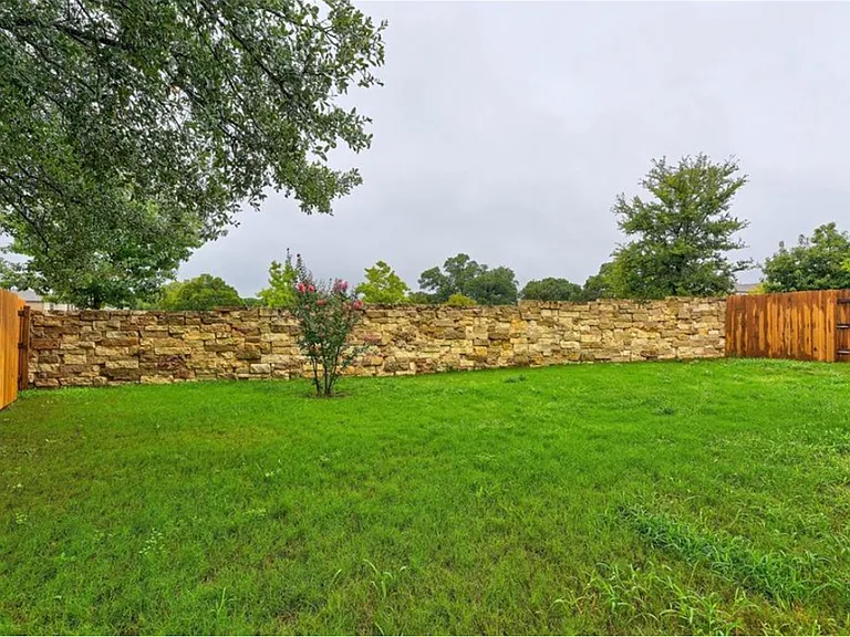 Private fenced-in backyard