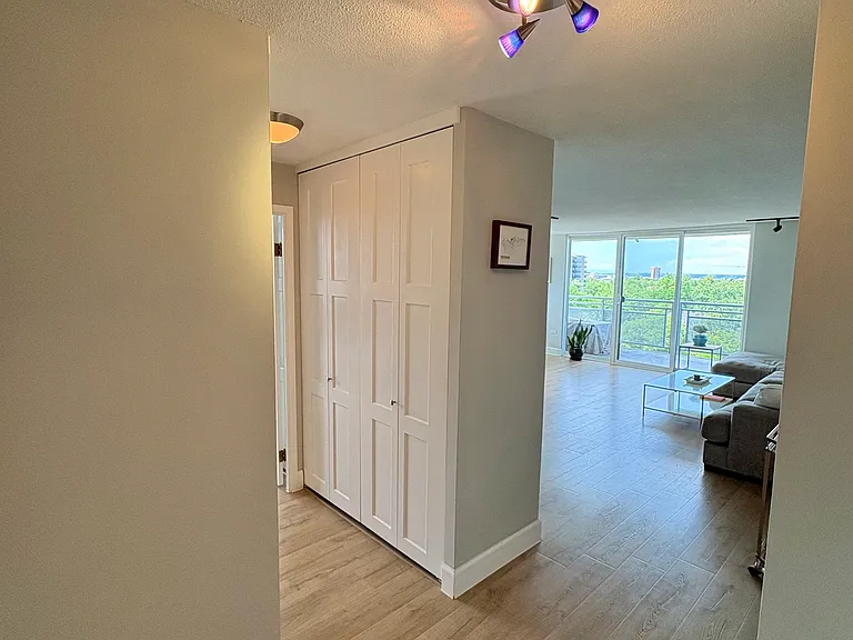 View upon entering, coat closet in the hallway
