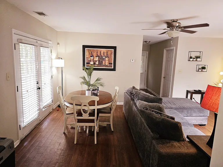 2nd living room, looking from kitchen. Back patio is thru french doors.