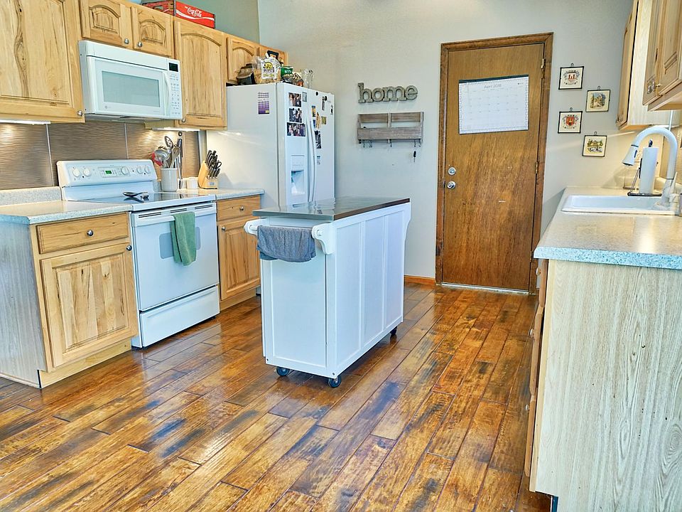 kitchen with door from 4 car garage