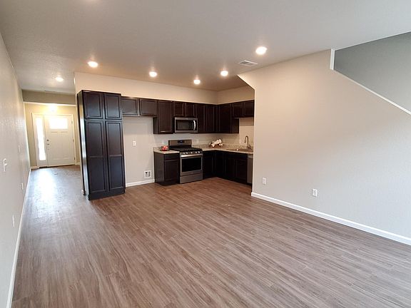 Brand new appliances: Refrigerator, stove/oven/range, Microwave Oven, Dishwasher. Open floor plan