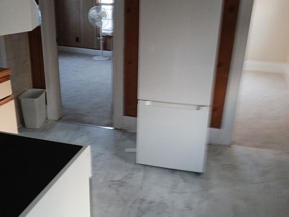 Kitchen photo. New energy efficient refrigerator.