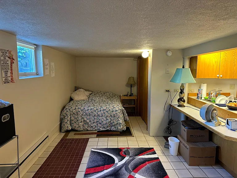 this is the queen bed off dinning and or kitchen space if wanted. the windows are on side of house west..