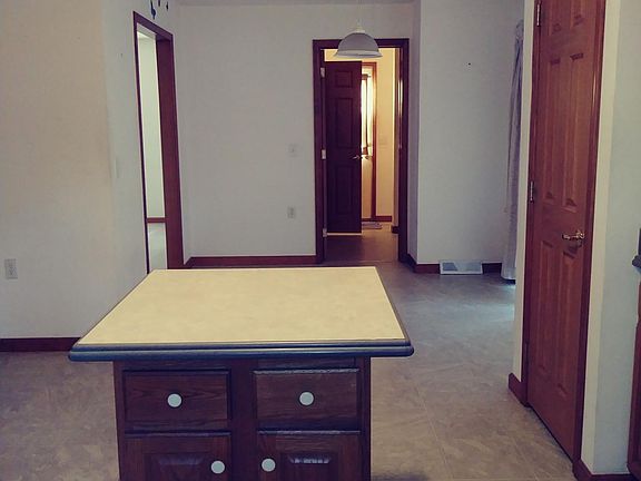 Laundry room and half bath off of kitchen