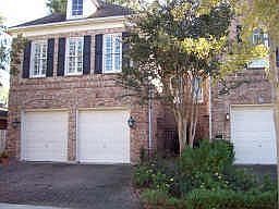 Wonderful two story brick patio home in the heart of West University. Privacy gate in front has flow