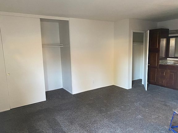 Master bedroom with his & hers closets and bathroom