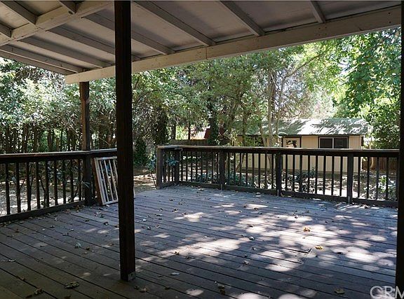 Large back deck part covered, large work shop with electricity