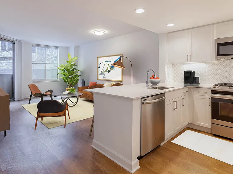 Kitchen with Gas Stove, Stainless Steel Appliances and Quartz Countertops