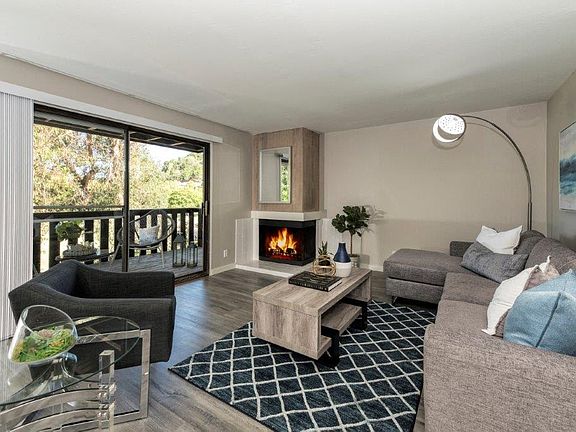 Parkside Apartments living room and balcony view