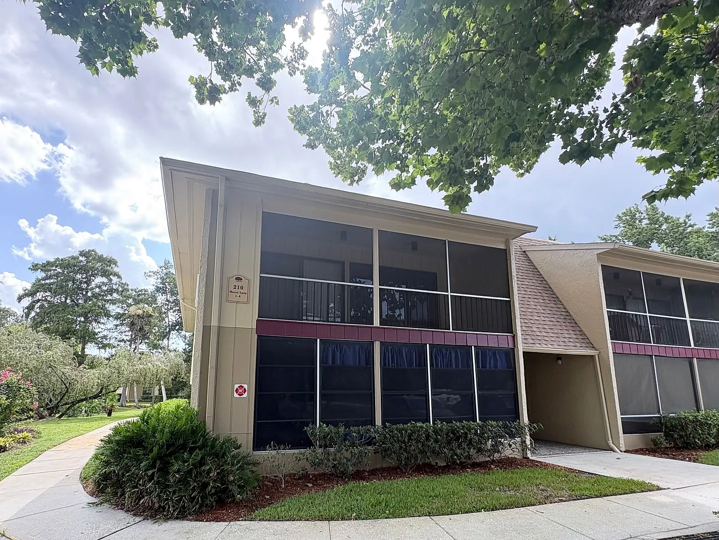 Nicely Updated 1/1 Condo in Winter Springs ~ Wood Plank Tile Floors and Large Screened Patio! — Photo 1