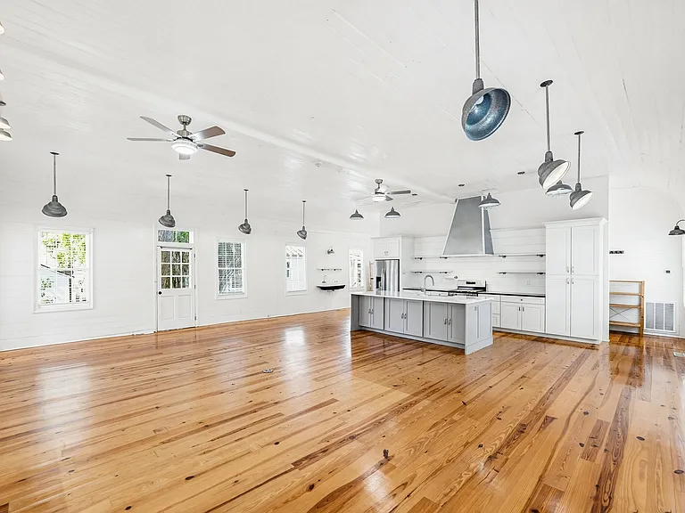main living dining and kitchen, laundry space is behind wall on the back right