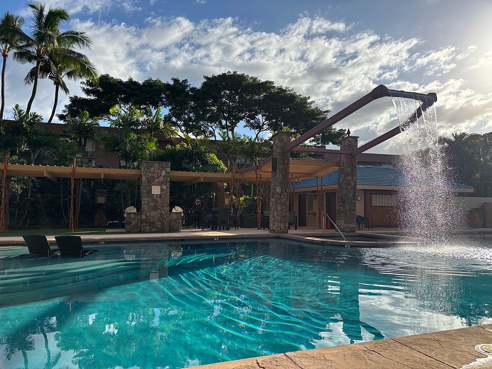 The Breakers 25M, half Olympic-sized pool, waterfall, jacuzzi & BBQ/picnic area_ lush landscape surrounding private pool & indoor gym.