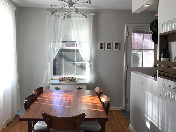 Dining room, kitchen and door to patio