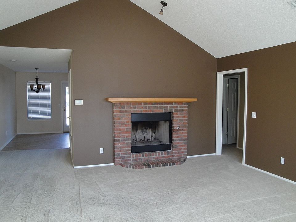Open floor plan with stylish colors, upgraded flooring and cozy fireplace