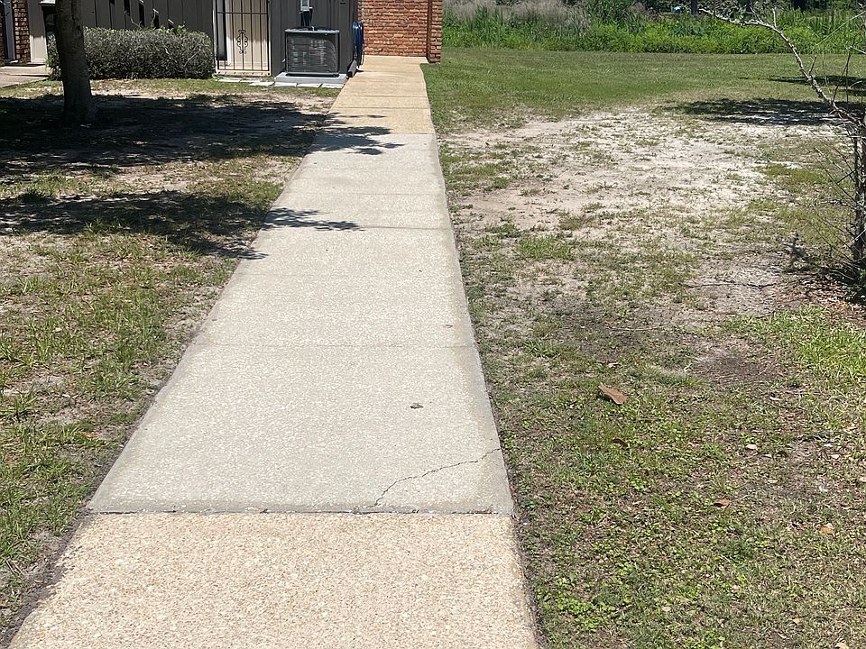 Walkway from parking lot to entry