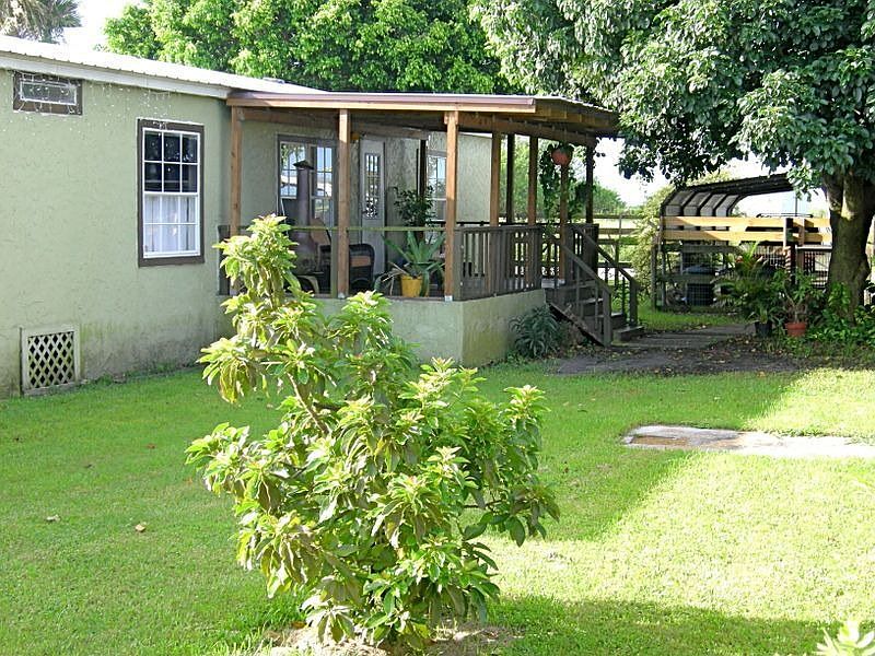 Front Porch/Carport beyond