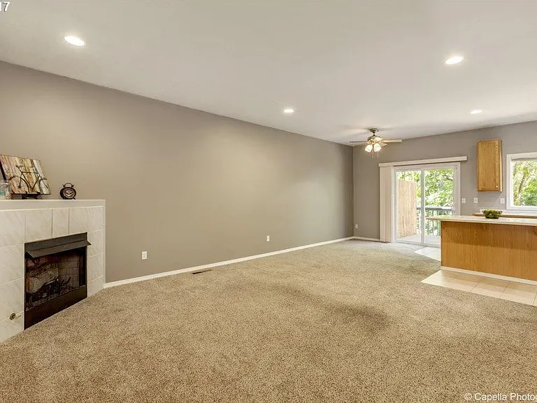 Open Concept Living and Dining Room leading to deck