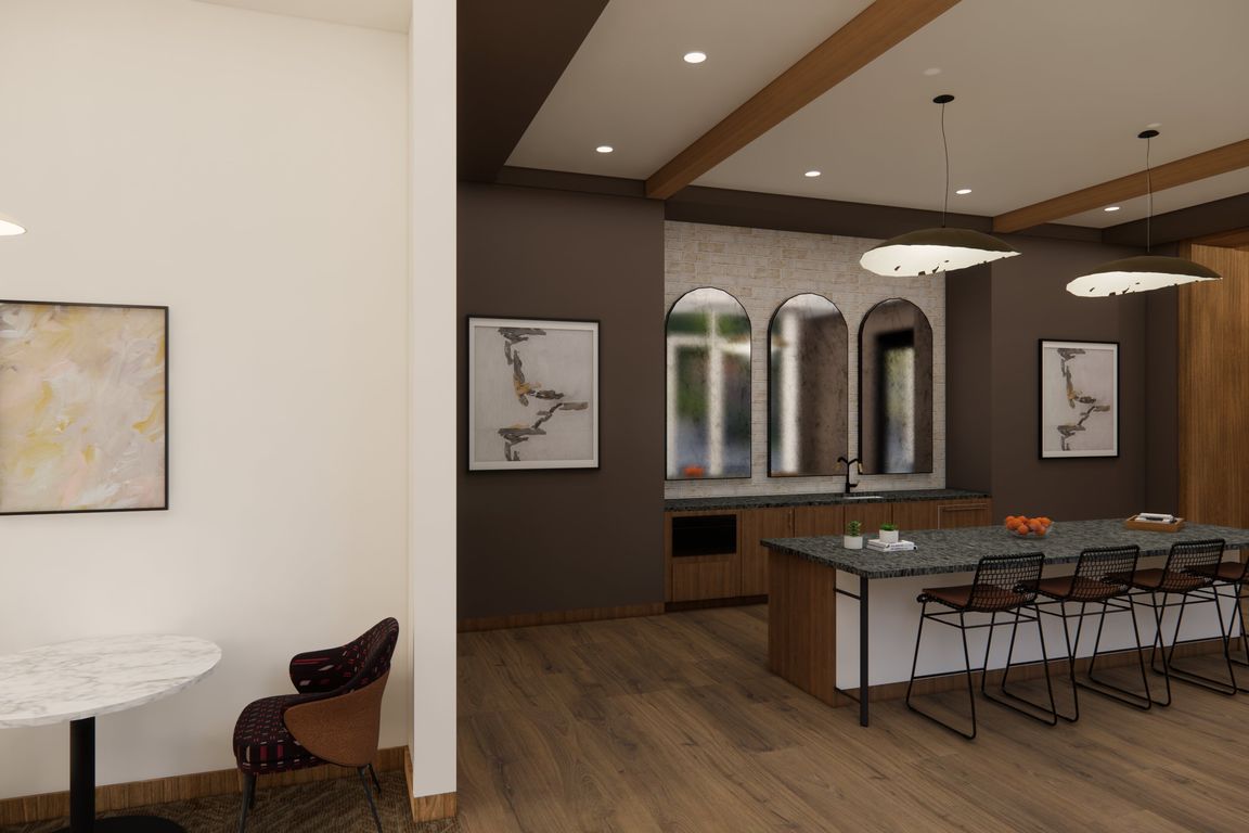 Take advantage of the versatile coworking area with gathering spaces and private conference room.