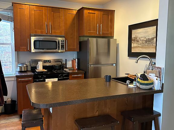 Kitchen with dishwasher, microwave, and garbage disposal