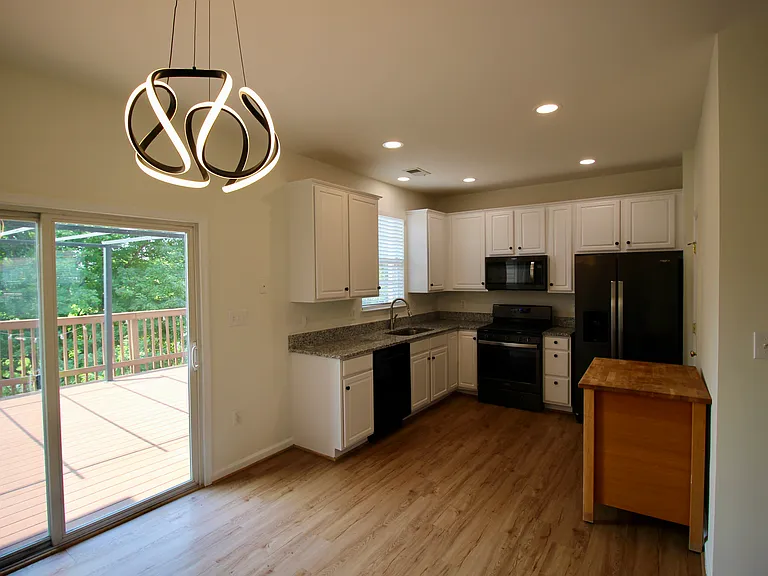 Gourmet kitchen with granite countertops and stainless steel appliances