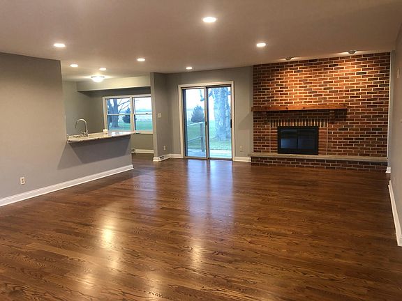 Gleaming new hard wood floors throughout this wonderful open concept design.