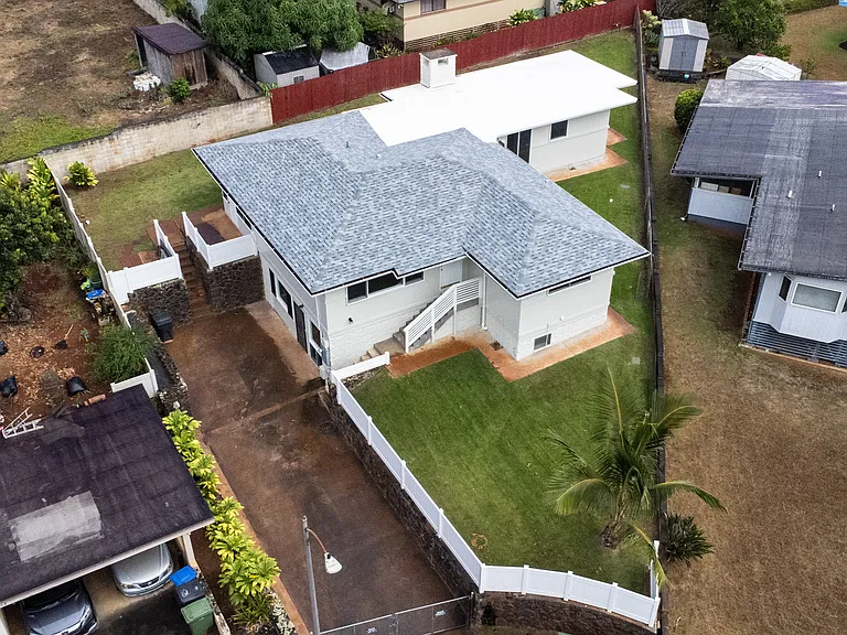 Aerial view of home, available unit is downstairs