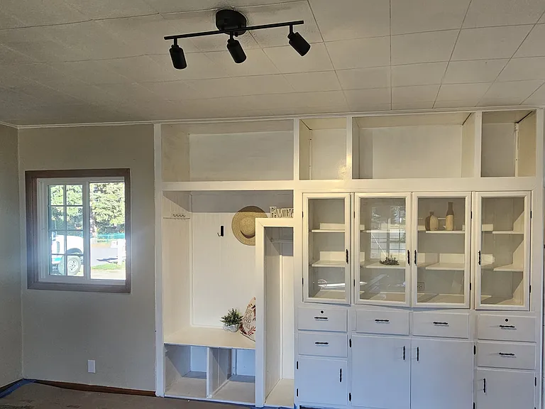 Built in china hutch, display areas and welcome nook with track light illumination