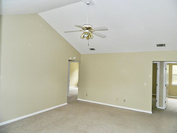 Two bedrooms through the door on the left and two bedrooms through the door on the right.