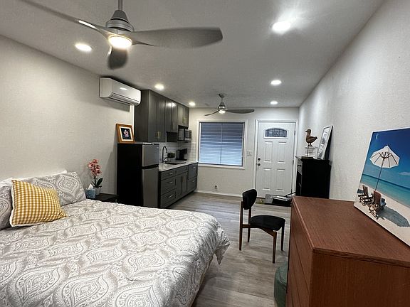 Freshly painted with vinyl flooring. Bed, dresser, small desk and desk chair for tenant use.