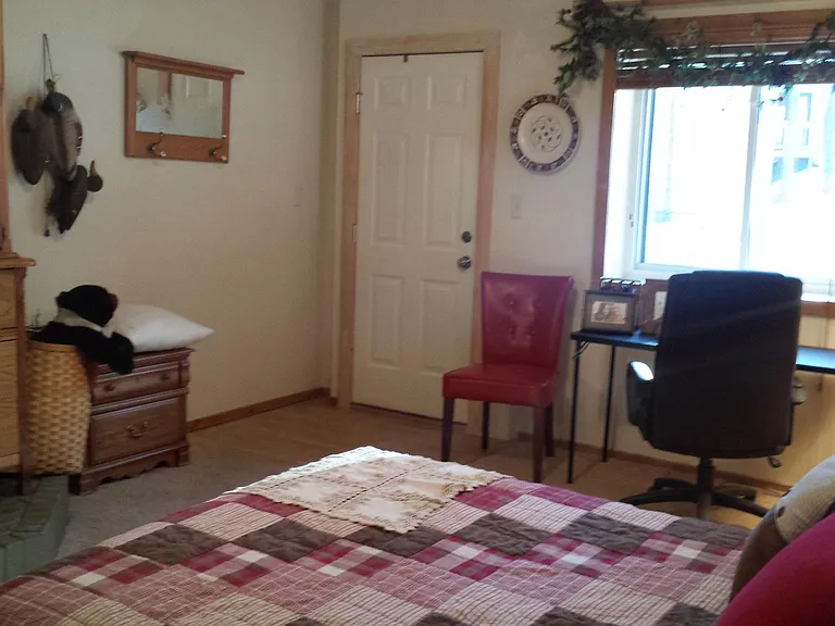 Private entrance in and out of studio. Studio has room enough for an office set up. Or you can have a sitting area. Large furnished patio right outside your door leading to your parking area. Wooded lot.