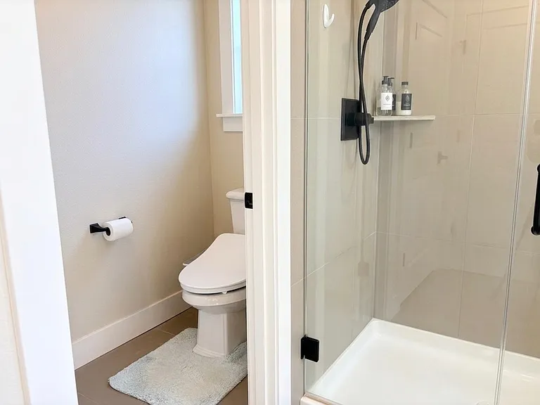 Spacious master bathroom with bathtub