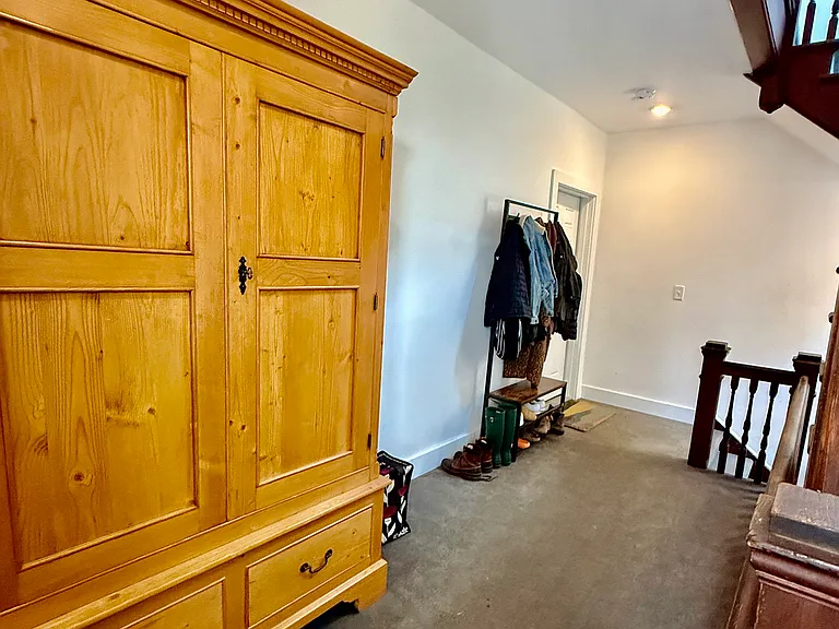 Second floor landing - armoire for second floor tenant for extra storage