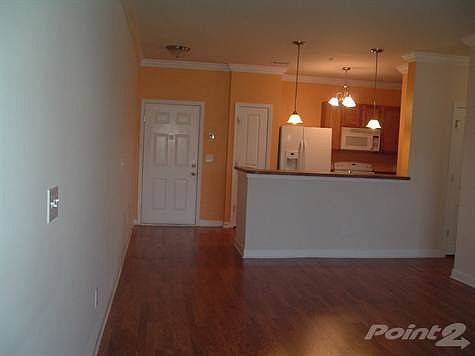 view of dining area to kitchen from living room