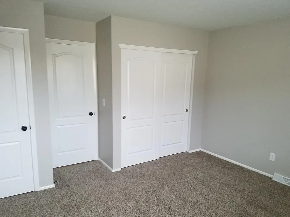 Master bed with two closets