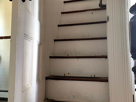 Stairs leading to third floor aka second bedroom
