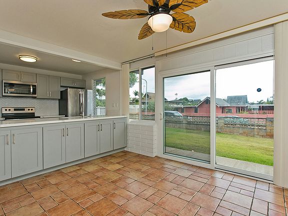 DIning and Kitchen open to outside and living area.