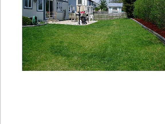 Side view of the House and Storage Shed