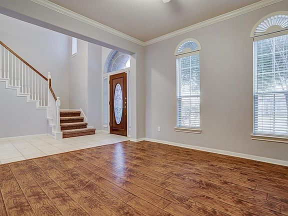 Dining room with plenty of room for entertaining guests and lots of natural light.
