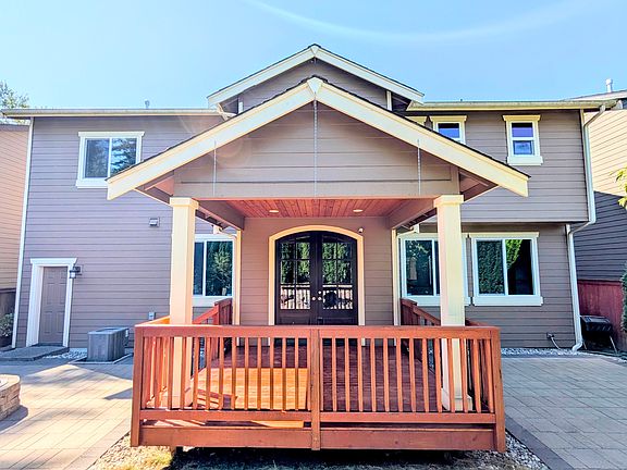 Backyard (Wooden deck, Stone patio, Wood firepit)