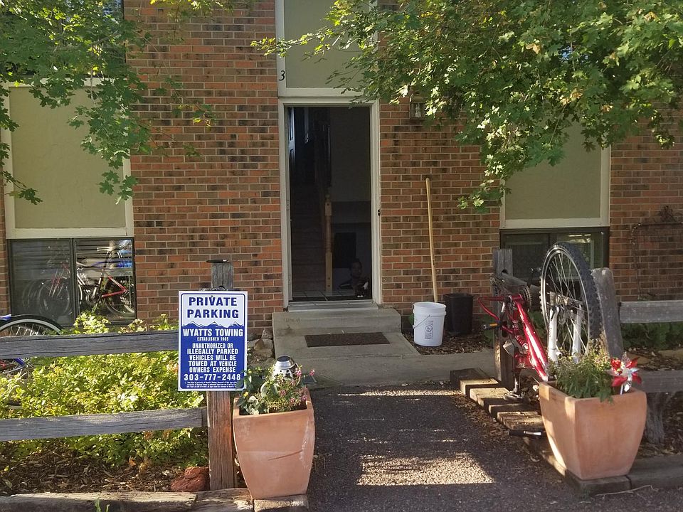 Front entrance (outside) with 2 parking spots