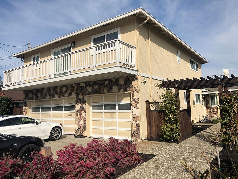 Available unit on second floor of this duplex