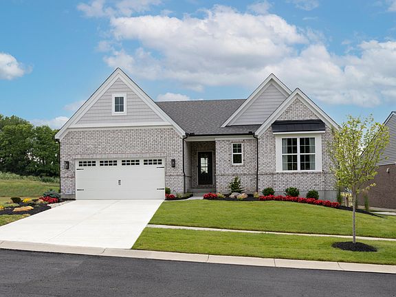 custom home with brick exterior