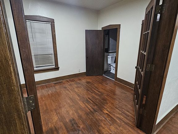 Walking into the French doors of the master bedroom