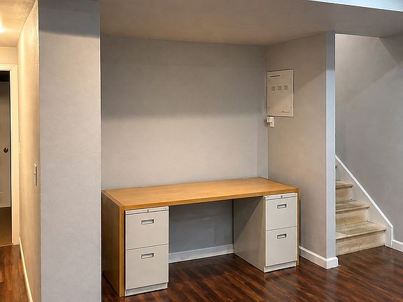 This desk can stay or be removed. We are currently refinishing the stairs.
