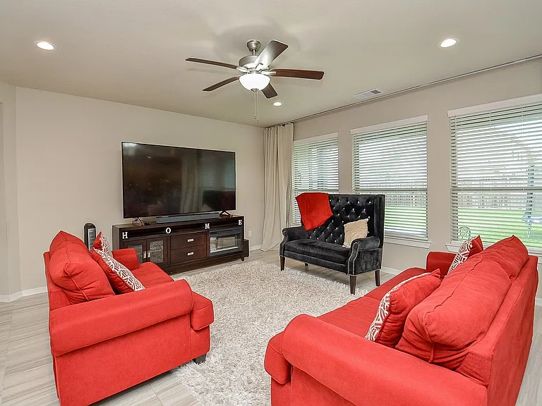 Grand style windows that let in plenty of natural light. Remote controlled black-out curtains to block out lights when you choose.